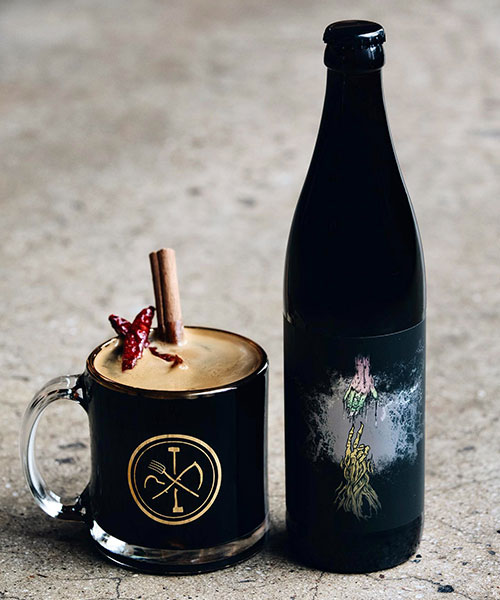 burial brewing bottle of beer with mug of stout and spices