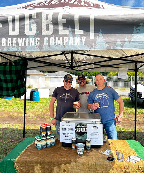 fogbelt brewing reps pouring under tent